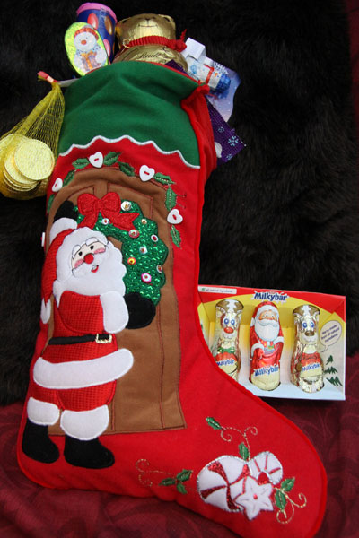 Christmas stocking filled with chocolate